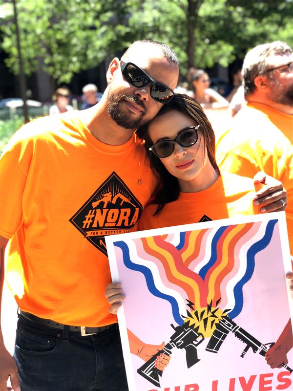 Khary Penebaker at March for Our Lives rally wearing NORA orange shirt