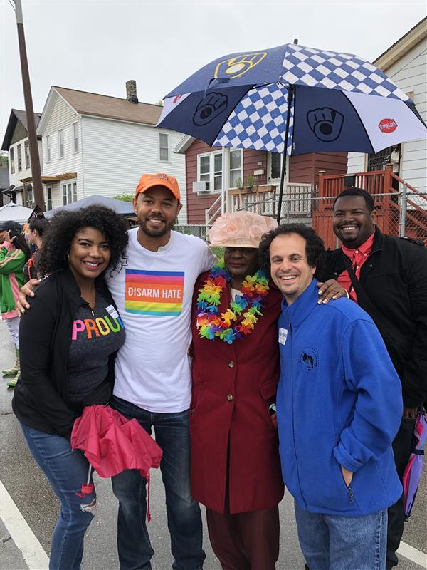 Khary Penebaker at pride event wearing Disarm Hate shirt