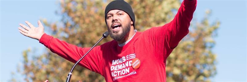 Khary Penebaker speaking at Moms Demand Action rally