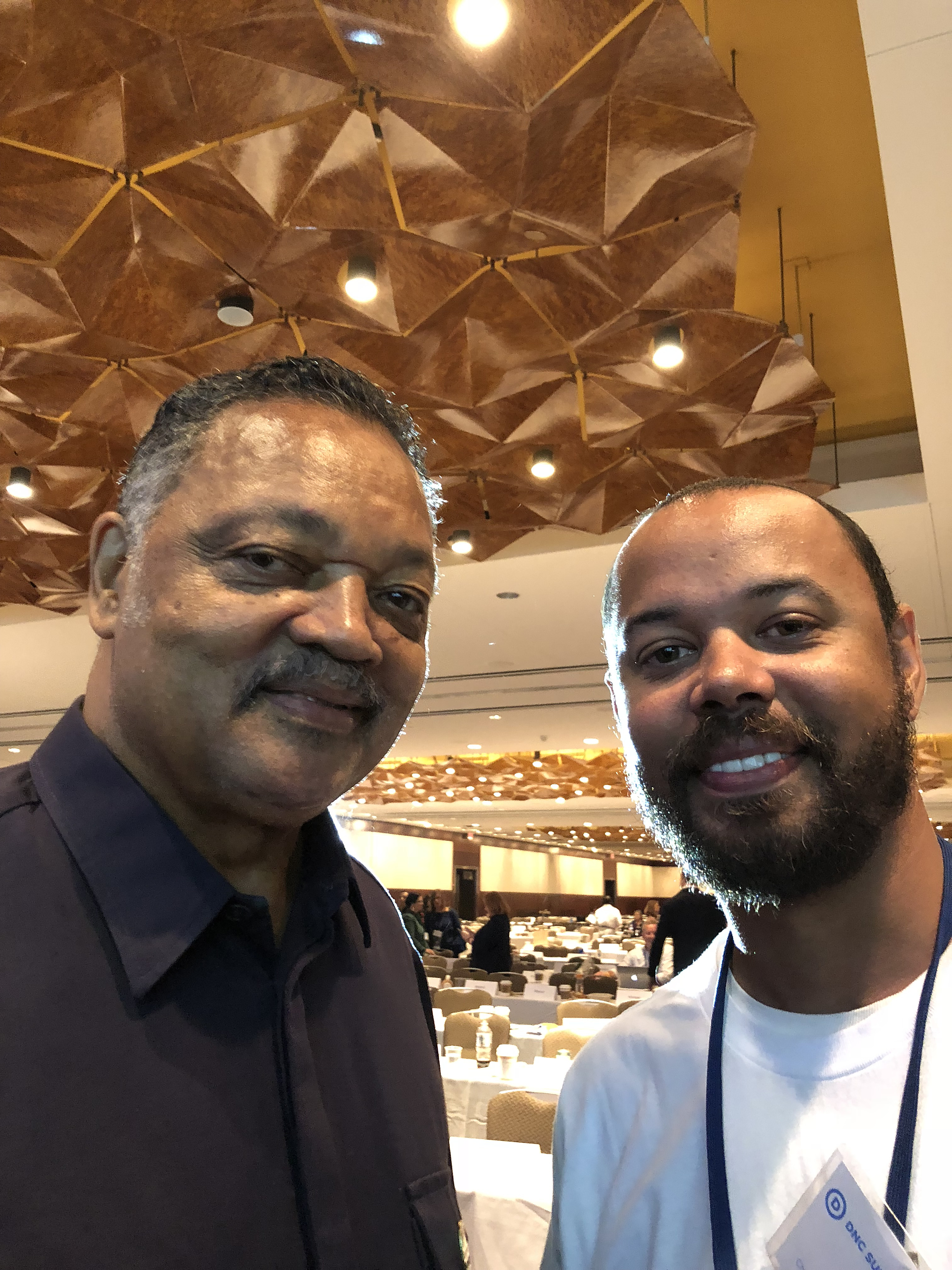 Khary Penebaker with Reverend Jesse Jackson at DNC Summer Meeting