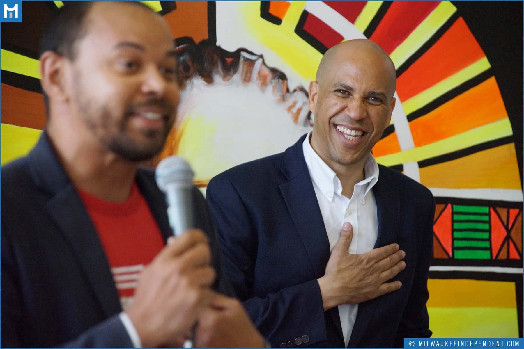 Khary Penebaker introducing Senator Cory Booker at a Milwaukee event