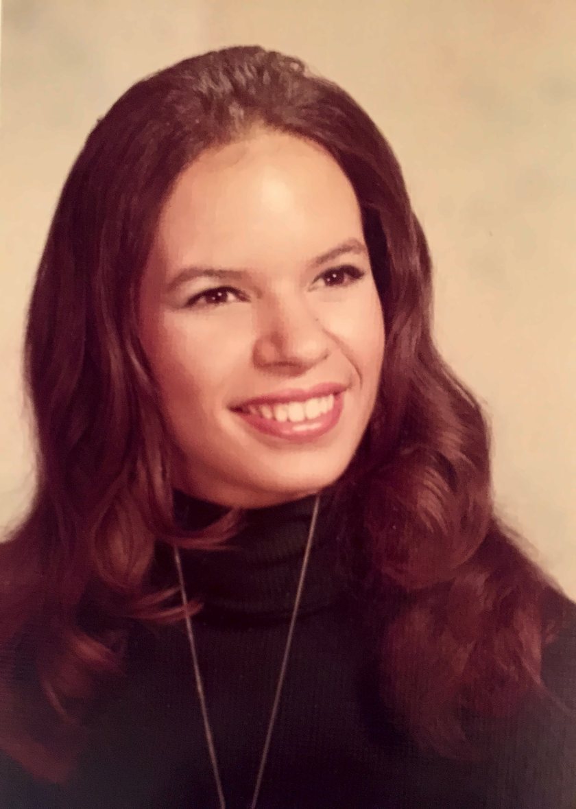 My mother, Joyce, smiling in a studio portrait